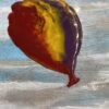 Purple Orange Red Swirl Balloon situated Towards the Clouds Cover