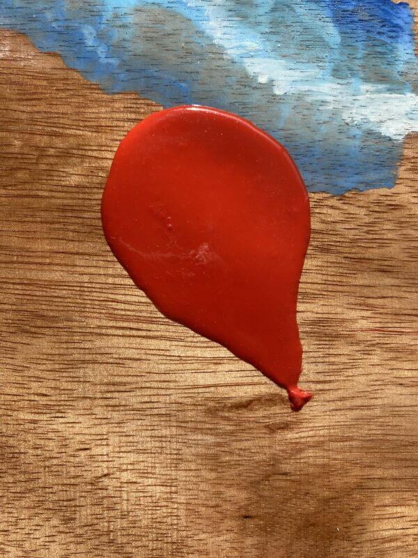 Orange Balloon across a Sandy Cloud Sky Cover